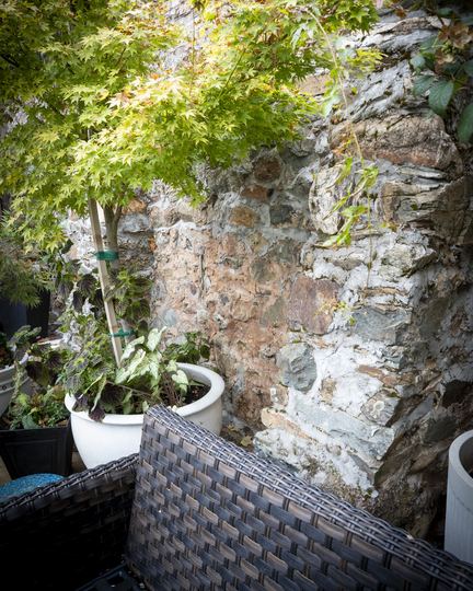 The courtyard wall where the tunnel was concreted over